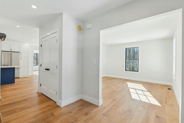 11 Acorn Ave, Kennebunkport, ME 04046 - hallway featuring light wood-type flooring, recessed lighting, and baseboards