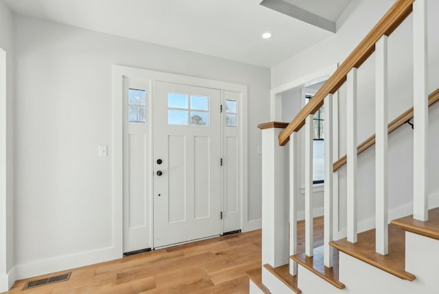 11 Acorn Ave, Kennebunkport, ME 04046 - foyer featuring recessed lighting, light wood finished floors, stairway, and baseboards