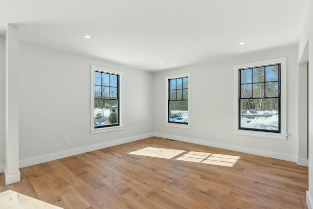 11 Acorn Ave, Kennebunkport, ME 04046 - unfurnished room with plenty of natural light, light wood finished floors, baseboards, and recessed lighting