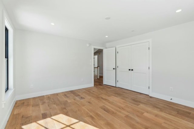 11 Acorn Ave, Kennebunkport, ME 04046 - unfurnished bedroom with light wood-type flooring, baseboards, recessed lighting, and a closet