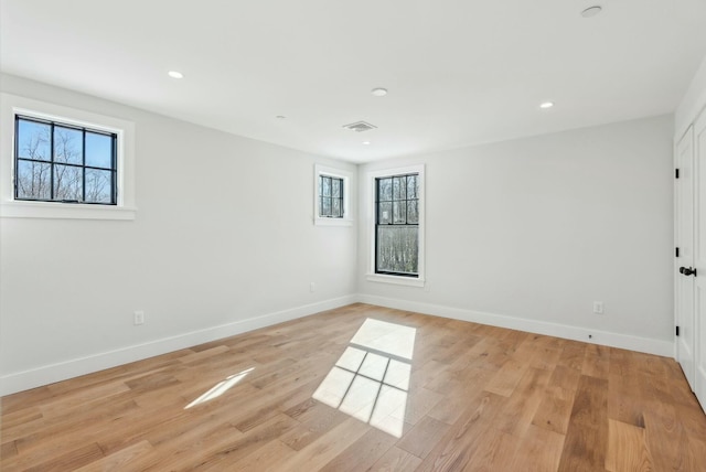 11 Acorn Ave, Kennebunkport, ME 04046 - empty room featuring healthy amount of natural light, baseboards, light wood finished floors, and recessed lighting
