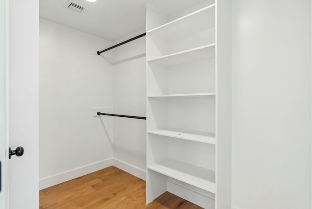 11 Acorn Ave, Kennebunkport, ME 04046 - walk in closet featuring wood finished floors