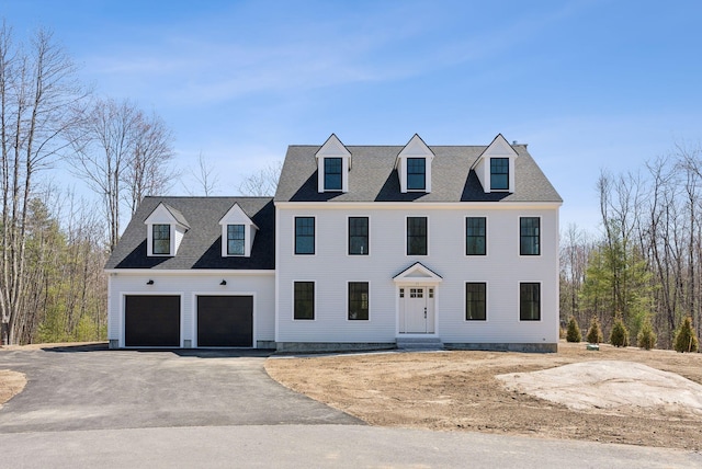 11 Acorn Ave, Kennebunkport, ME 04046 - view of front of house with asphalt driveway and a garage