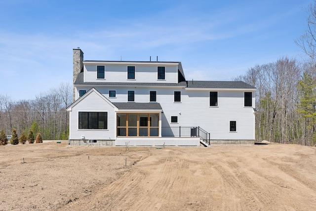 11 Acorn Ave, Kennebunkport, ME 04046 - rear view of house featuring a chimney