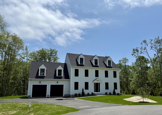 11 Acorn Ave, Kennebunkport, ME 04046 - colonial home featuring driveway, a garage, and a front yard
