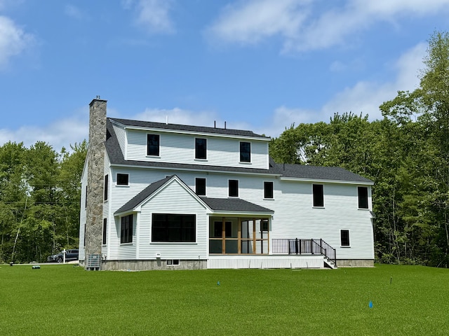 11 Acorn Ave, Kennebunkport, ME 04046 - rear view of house with a lawn, a chimney, and a shingled roof