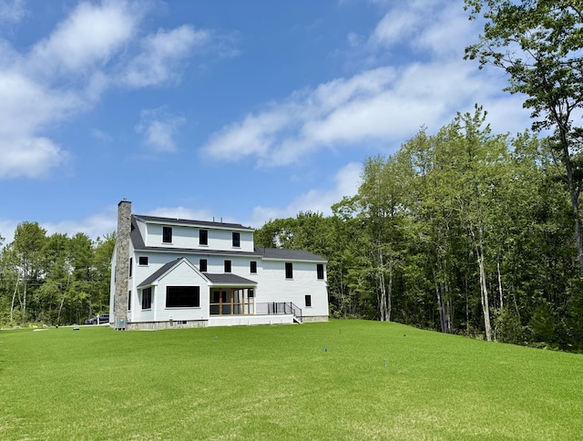 11 Acorn Ave, Kennebunkport, ME 04046 - rear view of house with a chimney and a yard