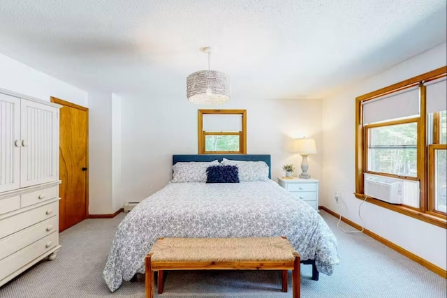 597 Sweden Rd, Bridgton, ME 04009 - bedroom with multiple windows, light colored carpet, baseboard heating, and baseboards