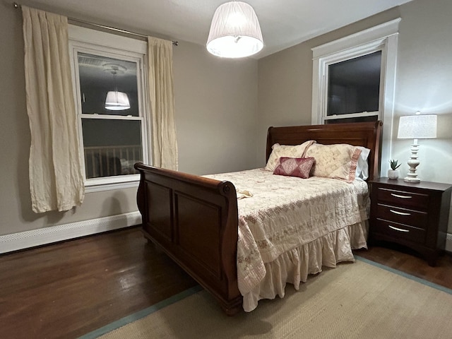 bedroom with wood finished floors
