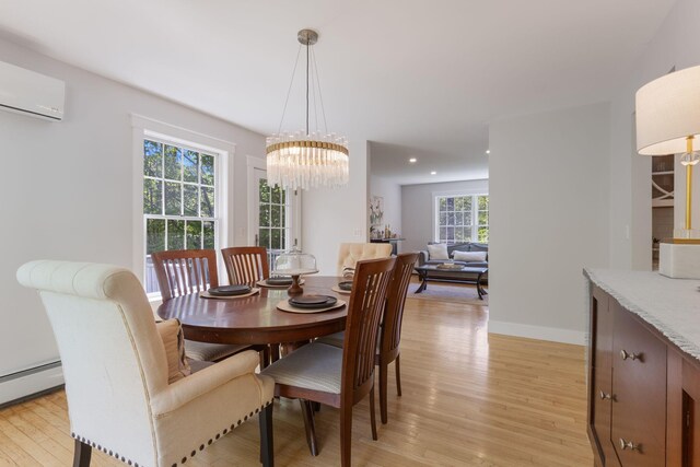 11 Oxford Rd, Windham, ME 04062 - dining area with light wood-style floors, recessed lighting, a chandelier, a baseboard heating unit, and baseboards