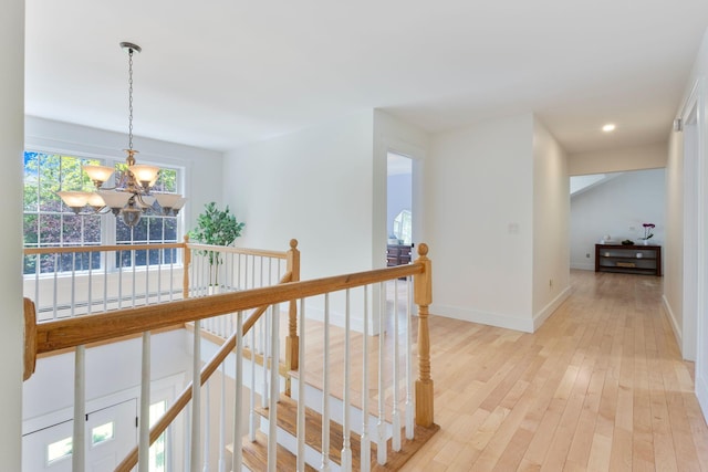 11 Oxford Rd, Windham, ME 04062 - hall with an upstairs landing, a chandelier, baseboards, light wood-style flooring, and recessed lighting