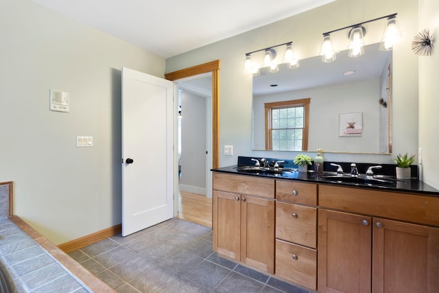 11 Oxford Rd, Windham, ME 04062 - full bath featuring double vanity, tile patterned floors, and baseboards