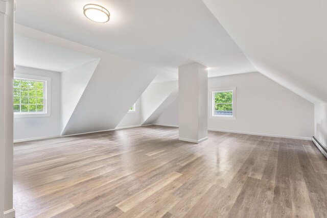 11 Oxford Rd, Windham, ME 04062 - bonus room featuring wood finished floors, lofted ceiling, and baseboards