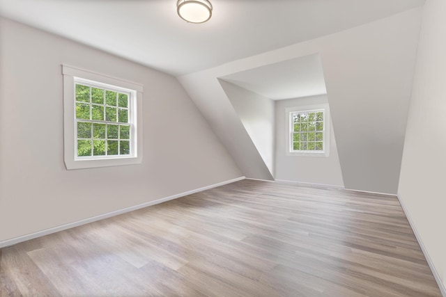 11 Oxford Rd, Windham, ME 04062 - bonus room featuring light wood finished floors, baseboards, and lofted ceiling