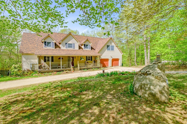 1 Mayflower Way, Norway, ME 04268 - view of front of property with covered porch, dirt driveway, and an attached garage