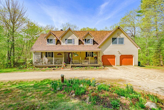 1 Mayflower Way, Norway, ME 04268 - view of front facade with driveway, a garage, covered porch, and roof with shingles