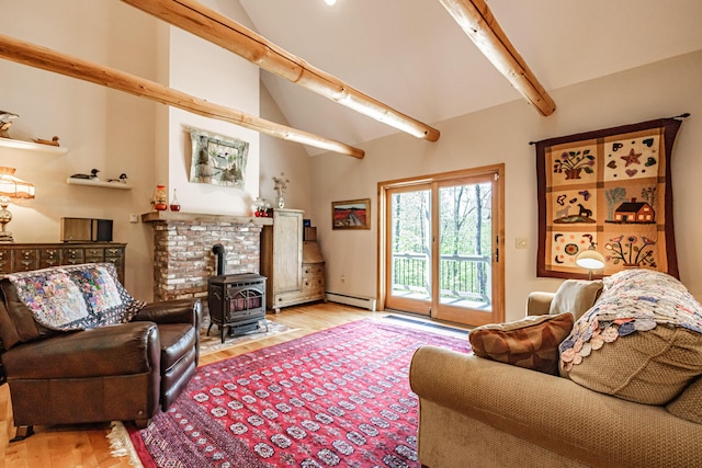 1 Mayflower Way, Norway, ME 04268 - living area featuring light wood-style floors, a wood stove, baseboard heating, beamed ceiling, and high vaulted ceiling