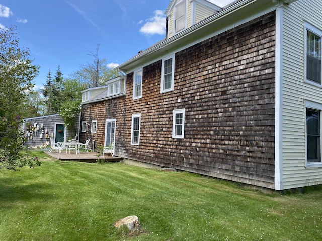 12 Old Rte 1, Searsport, ME 04974 - view of home's exterior with a wooden deck and a yard