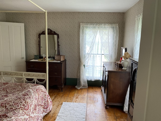 12 Old Rte 1, Searsport, ME 04974 - bedroom featuring multiple windows, light wood finished floors, and wallpapered walls