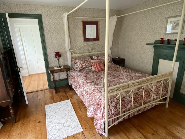 12 Old Rte 1, Searsport, ME 04974 - bedroom with hardwood / wood-style floors and wallpapered walls