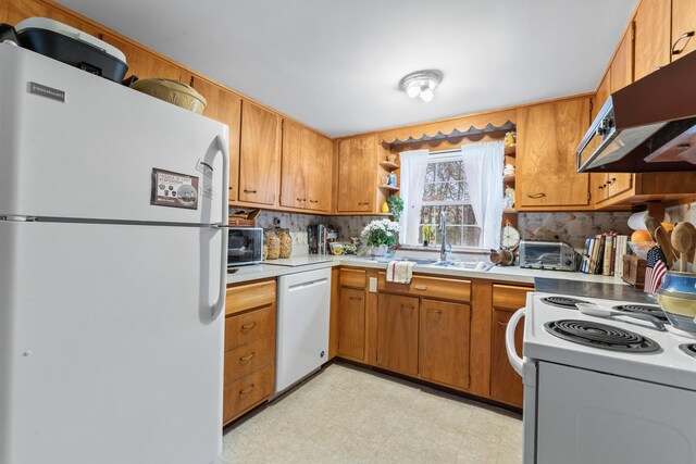 342 York St, York, ME 03909 - kitchen featuring white appliances, light flooring, open shelves, under cabinet range hood, and light countertops