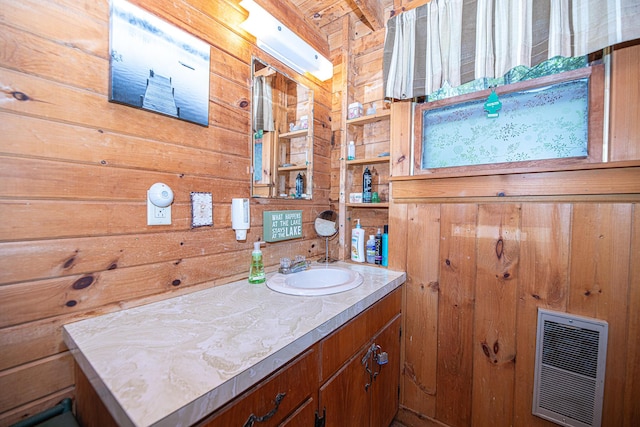 106 Shady Ln, Parsonsfield, ME 04047 - bathroom featuring wooden walls, vanity, and heating unit