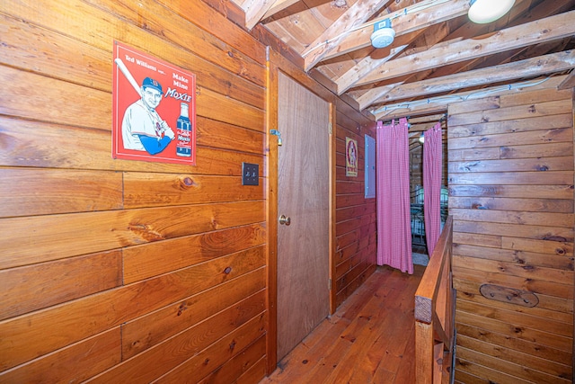 106 Shady Ln, Parsonsfield, ME 04047 - hallway with wooden walls, wood-type flooring, and wooden ceiling