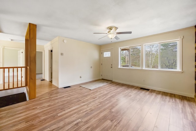 227 Forest Ave, Orono, ME 04473 - spare room with a ceiling fan, light wood-style floors, and baseboards