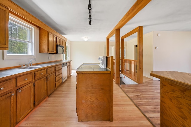 227 Forest Ave, Orono, ME 04473 - kitchen with stove, dishwasher, light wood-style floors, and brown cabinetry