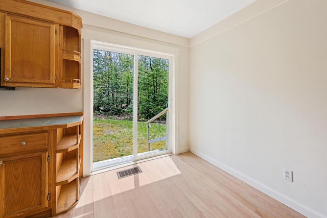 227 Forest Ave, Orono, ME 04473 - entryway with light wood finished floors and baseboards