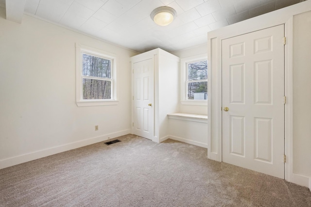 227 Forest Ave, Orono, ME 04473 - unfurnished bedroom with carpet and baseboards