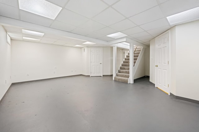 227 Forest Ave, Orono, ME 04473 - finished basement featuring stairs, baseboards, and a paneled ceiling