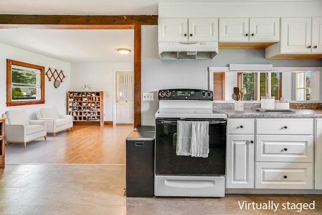 kitchen featuring electric stove, under cabinet range hood, white cabinets, and light wood-style flooring