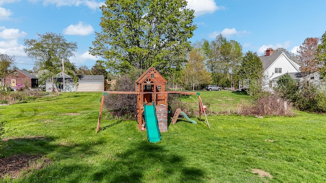 view of playground featuring a lawn