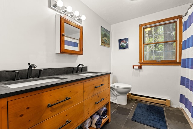 28 Ridgewood Dr, Eliot, ME 03903 - bathroom featuring a baseboard heating unit, double vanity, toilet, and tile patterned flooring