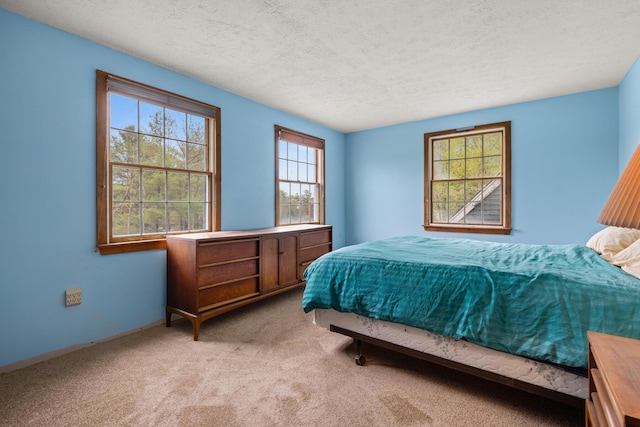 28 Ridgewood Dr, Eliot, ME 03903 - carpeted bedroom featuring a textured ceiling