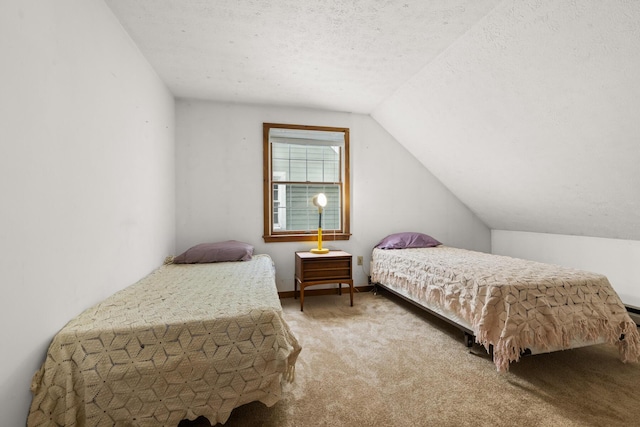 28 Ridgewood Dr, Eliot, ME 03903 - bedroom featuring carpet floors, lofted ceiling, and a textured ceiling