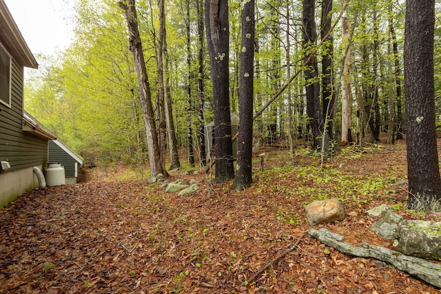 28 Ridgewood Dr, Eliot, ME 03903 - view of yard with a wooded view