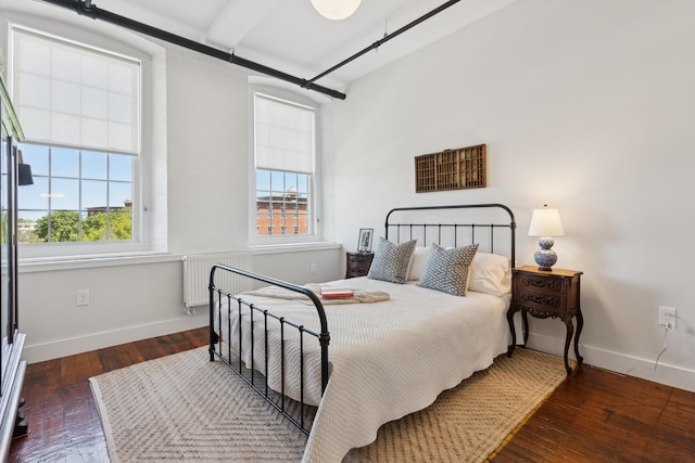 2 Main St Unit 17-410, Biddeford, ME 04005 - bedroom with multiple windows, baseboards, and wood-type flooring