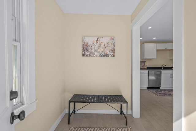 558 High St, West Gardiner, ME 04345 - hallway with baseboards, recessed lighting, and a sink
