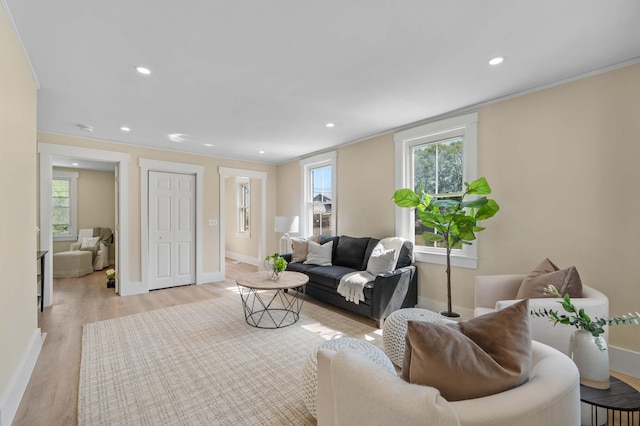558 High St, West Gardiner, ME 04345 - living area featuring light wood-style floors, recessed lighting, baseboards, and ornamental molding