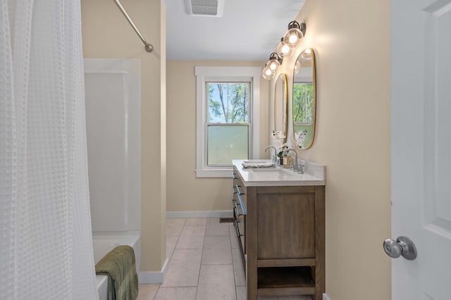 558 High St, West Gardiner, ME 04345 - full bath featuring vanity, shower / bath combination with curtain, baseboards, and tile patterned floors