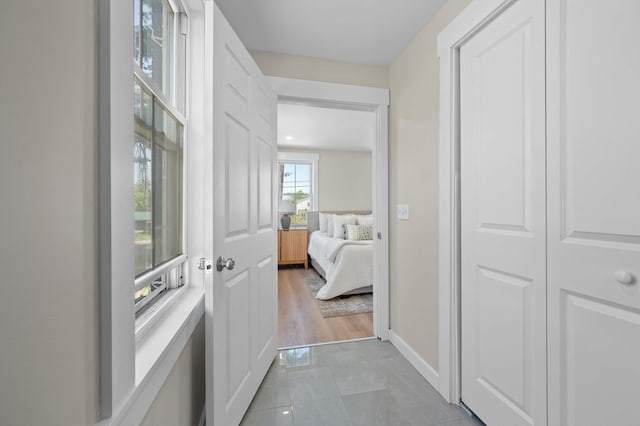 558 High St, West Gardiner, ME 04345 - corridor featuring baseboards and light tile patterned floors