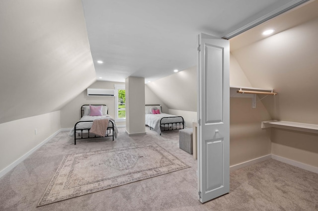 558 High St, West Gardiner, ME 04345 - carpeted bedroom with lofted ceiling, a wall mounted air conditioner, recessed lighting, and baseboards