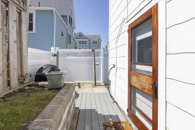 wooden deck featuring fence