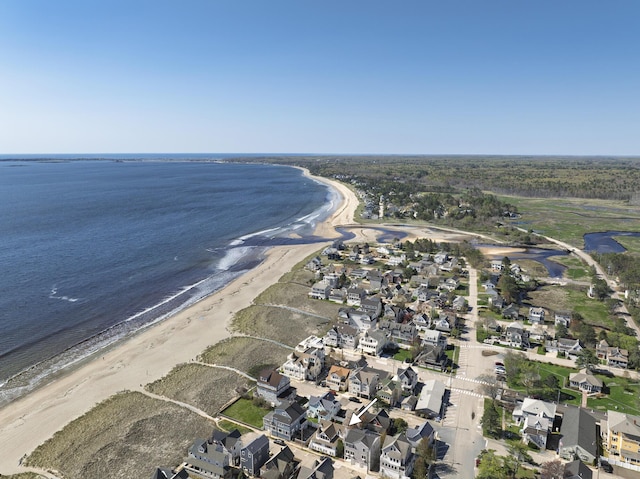 aerial overview of property's location featuring expansive coastline and nearby suburban area