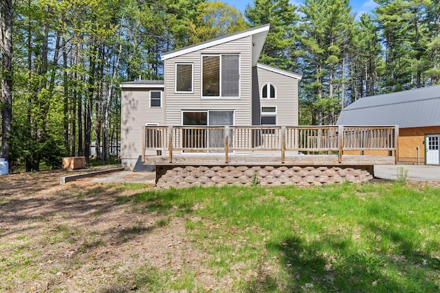 back of property with a deck