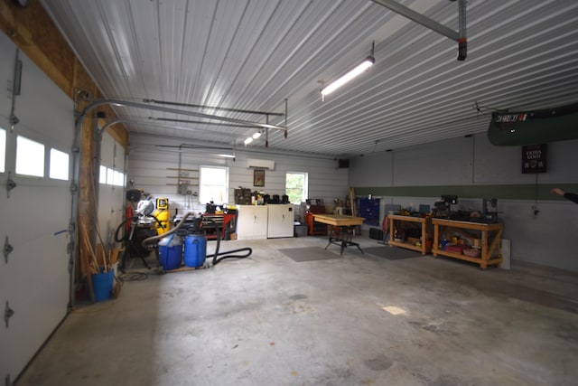 garage with a workshop area