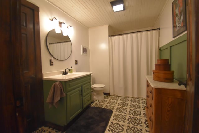 full bathroom featuring wood ceiling, vanity, toilet, and tile patterned floors