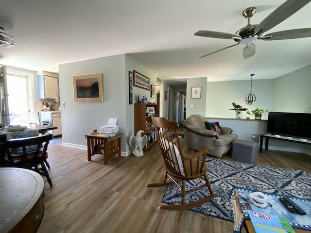 17 Canterbury Rd, Brewer, ME 04412 - living area featuring wood finished floors, a ceiling fan, and baseboards